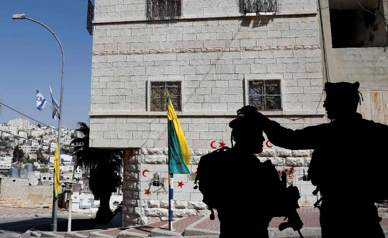 Israeli soldiers patrol near the Jewish neighborhood in the city of Hebron in the occupied West Bank on October 14, 2018.
