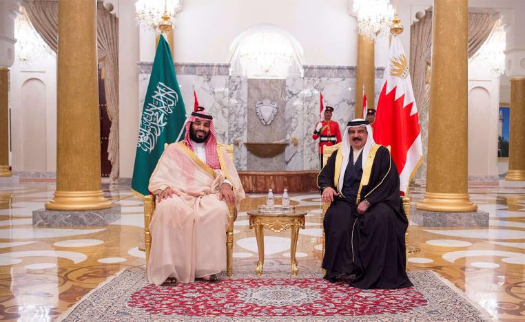 Saudi Arabia's Crown Prince Mohammed bin Salman Al Saud is received by Bahraini King Hamad bin Isa Al Khalifa in Manama