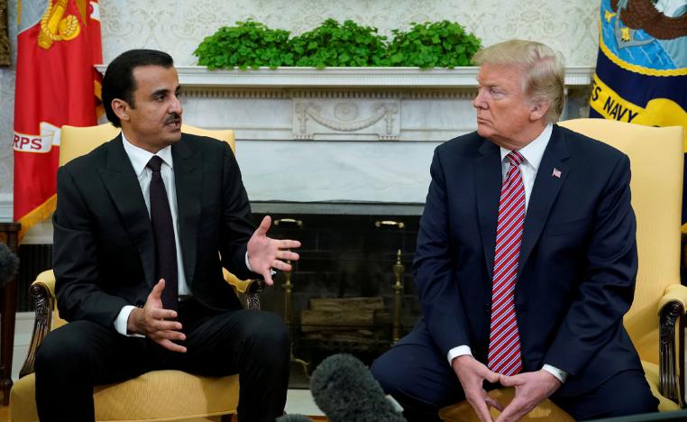 U.S. President Donald Trump meets Qatar's Emir Sheikh Tamim bin Hamad al-Thani in the Oval Office at the White House in Washington, U.S., April 10, 2018. 
