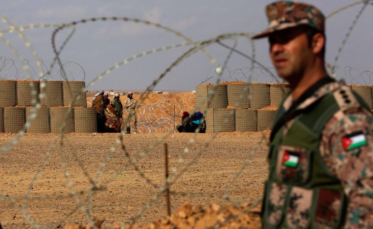 Jordanian soldier stands at the north eastern border with Syria, close to the informal Rukban camp.