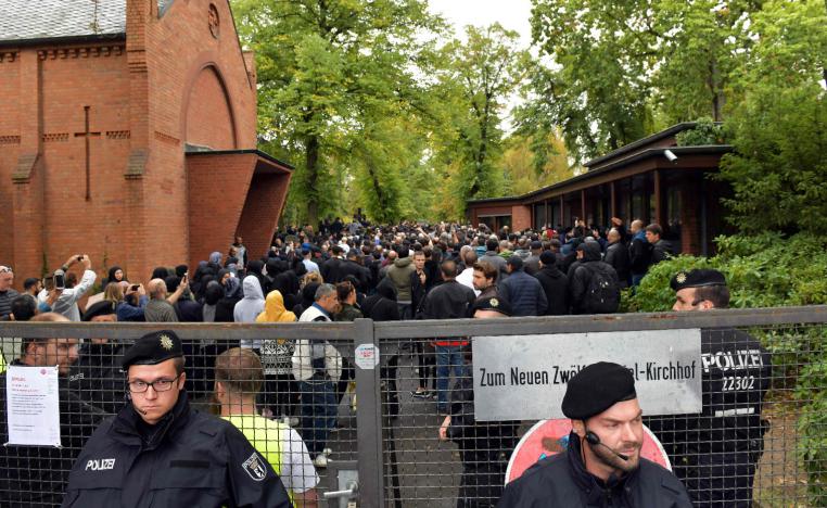 Police secure the area outside the New Twelve Apostle Churchyard where the funeral of shot multiple offender Nidal Rabih takes place in Berlin, on September 13, 2018.
