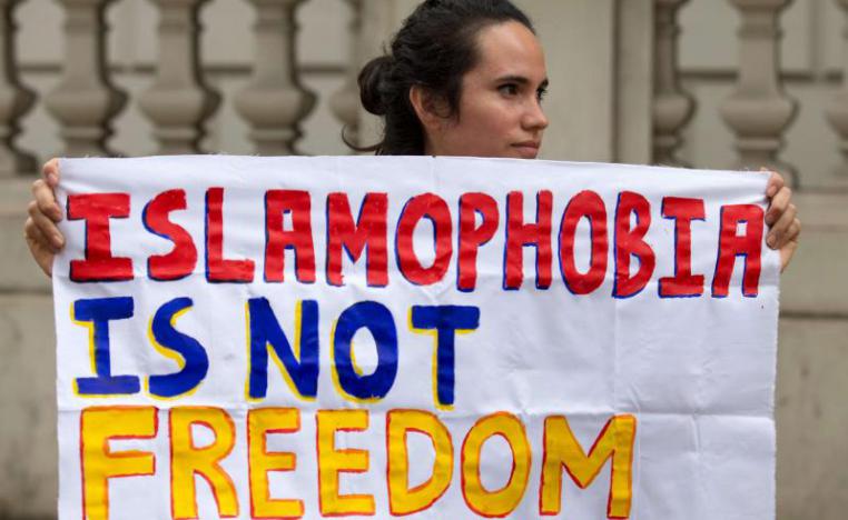 A protester participates in an anti-Islamophobia demonstration in London.