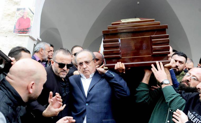 وئام وهاب خلال تشييع جنازة أحد مرافقيه الذي قتل في حادثة أمنية