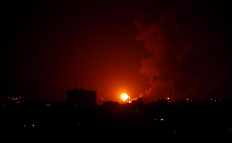An explosion is seen during Israeli air strikes in Gaza January 22, 2019.