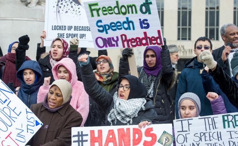 Supporters of Marzieh Hashemi, an American-born anchor for Iran's state television broadcaster, demonstrate outside the Federal Courthouse where Hashemi will appear before a U.S. grand jury, Wednesday, Jan. 23, 2019, in Washington.