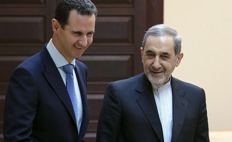 Syrian president Bashar Assad, left, meets with Ali Akbar Velayati, an adviser to Iran's Supreme Leader Ayatollah Ali Khamenei, in Damascus, Syria, Thursday, April 12, 2018.