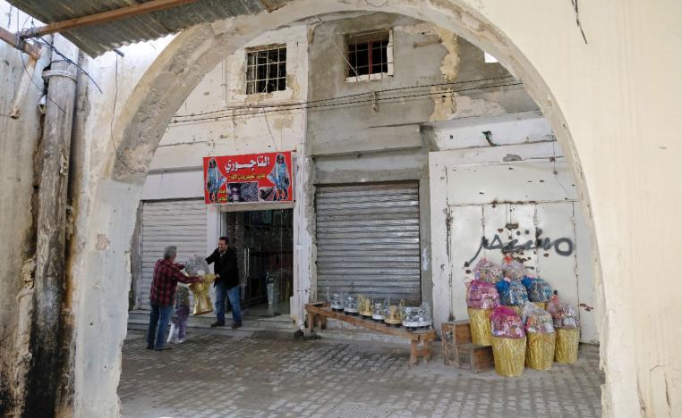 A shopkeeper sells traditional goods at the old popular market known as the Souk al-Jureid, which was destroyed during the war, in Benghazi, Libya February 7, 2019.
