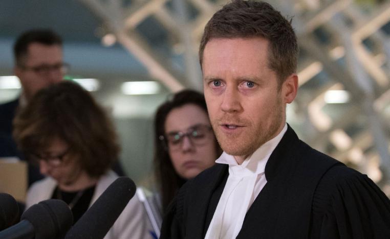 Crown prosecutor Thomas Jacques talks to the press in the Quebec City Courthouse following the sentencing of perpetrator Alexandre Bissonnette, on February 8, 2019.