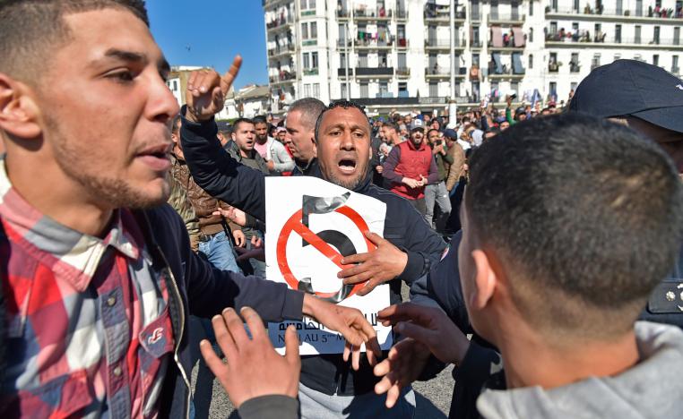 Algerian protestors demonstrate against their president's candidacy for a fifth term, on February 22, 2019 in Algiers.