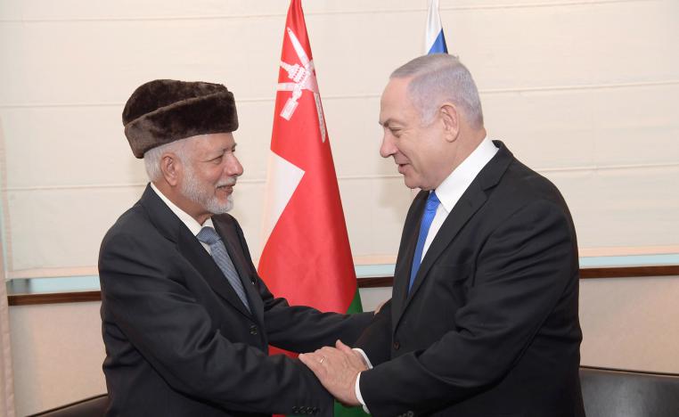Israeli Prime Minister Benjamin Netanyahu (R) shakes hands with Minister of Foreign Affairs of Oman Yusuf bin Alawi during their meeting on the sidelines of the Warsaw Middle East Summit.