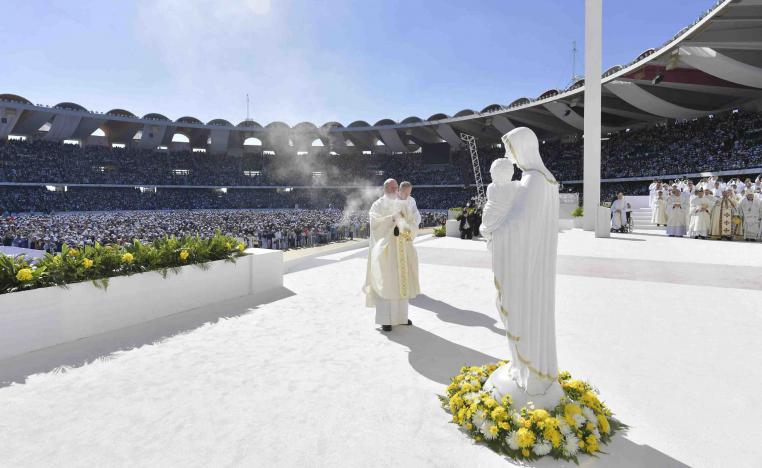 Tuesday's mass came a day after the pope called for an end to wars in the troubled Middle East, including in Yemen and Syria