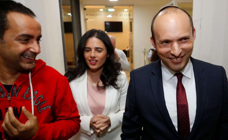 Israel's Minister of Education Naftali Bennett (R) and Israeli Justice Minister Ayelet Shaked (C) walk during a press conference to announce the formation of new political party HaYemin HeHadash or The New Right on December 29, 2018 in the coastal city of Tel Aviv.