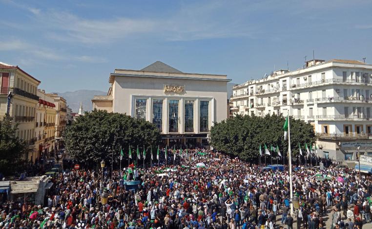 Algerians participate in a protest rally against their ailing president's bid for a fifth term in power, in the northeastern city of Annaba on March 5, 2019.