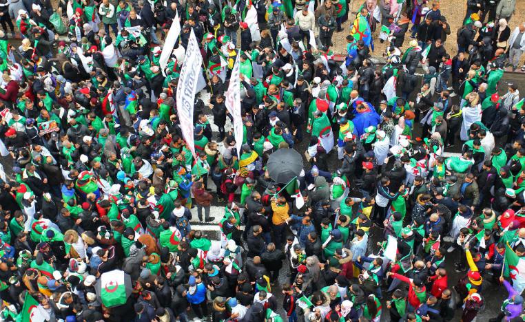 Algerians take part in a demonstration against ailing President Abdelaziz Bouteflika's bid for a fifth term on March 22, 2019, in the capital Algiers.