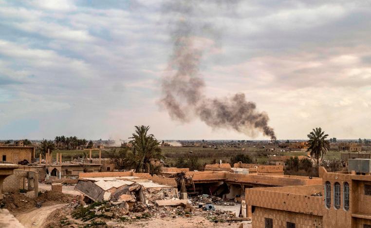 Smoke plumes billow from the remains of an Islamic State (IS) group jihadists' camp near the village of Baghouz in the eastern Syrian province of Deir Ezzor, on March 15, 2019.
