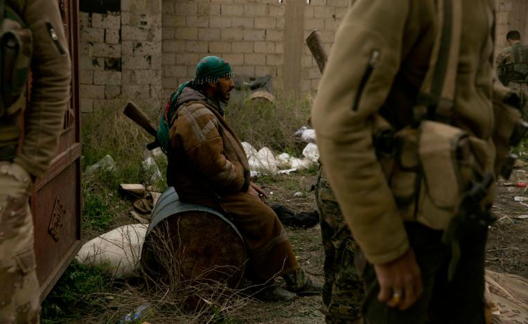U.S.-backed Syrian Democratic Forces (SDF) wait outside Baghouz, Syria, to go to the front line where Islamic State militants are staging counter attacks, Thursday, March 14, 2019.