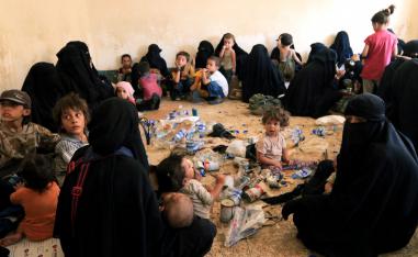 Families and relatives of Islamic State militants are seen after they surrender themselves to the Kurdish Peshmerga forces in al-Ayadiya, northwest of Tal Afar, Iraq, August 30, 2017.
