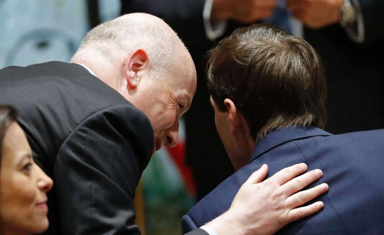 Jason Greenblatt (L) the US president's assistant and special representative for international negotiations, speaks to White House senior advisor Jared Kushner (C) during a press conference at the Israeli President's Residence in Jerusalem on May 22, 2017.