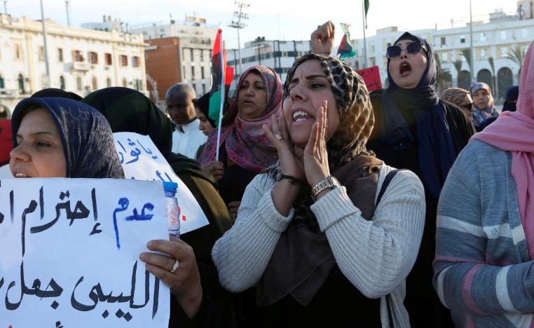 Libyan women chant slogans against General Khalifa Haftar from Libyan National Army during a protest in Tripoli, Libya March 8, 2019. 