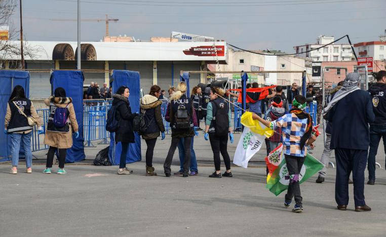 Turkish police officers check supporters of Peoples' Democratic Party (HDP) arriving for an election campain rally of HDP in Batman, south east Turkey on March 12, 2019.
