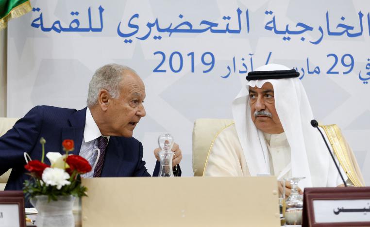 Arab League Secretary-General Ahmed Abul Gheit speaks to Saudi Arabia's Foreign Minister Ibrahim al-Assaf during a preparatory meeting with Arab foreign ministers ahead of the Arab summit in Tunis, Tunisia March 29, 2019.