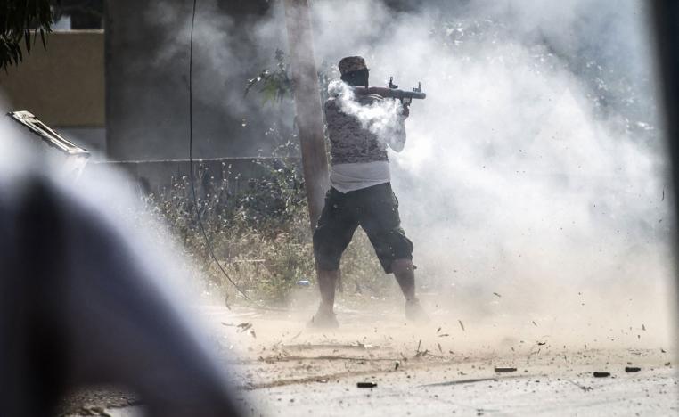 A fighter loyal to the GNA fires a rocket-propelled grenade in Tripoli
