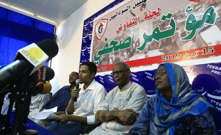 Members of the Sudanese Professionals Association give a press conference in the capital Khartoum