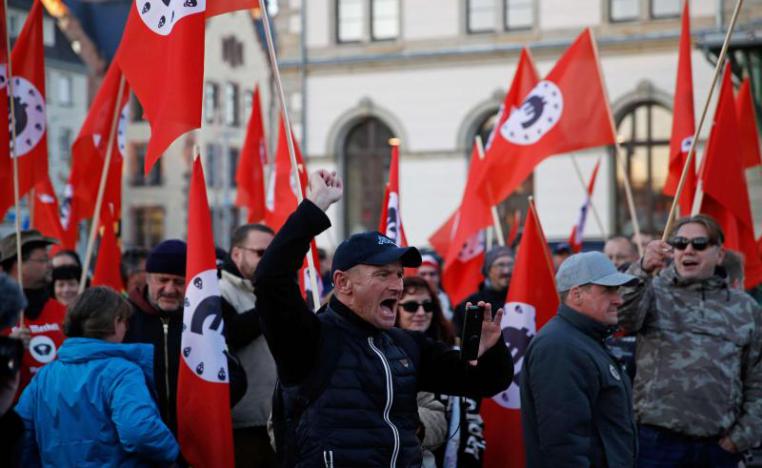 Far-right supporters shout slogans in the eastern German city of Chemnitz