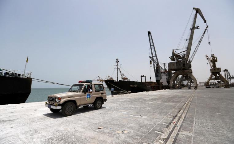 Yemeni local coast guards drive a car after their deployment at Hodeidah port