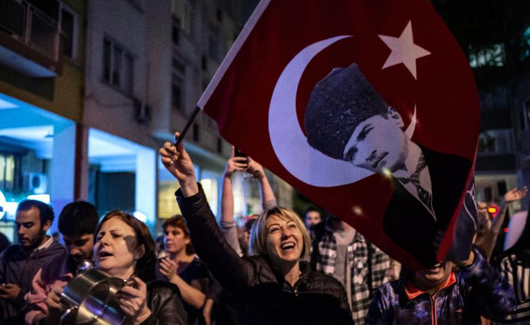 People shout anti-government slogans as they protest against a re-run of the election in Istanbul