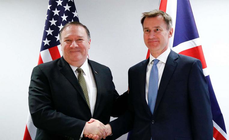 US Secretary of State Mike Pompeo (L) shakes hands with Britain's Foreign Secretary Jeremy Hunt 