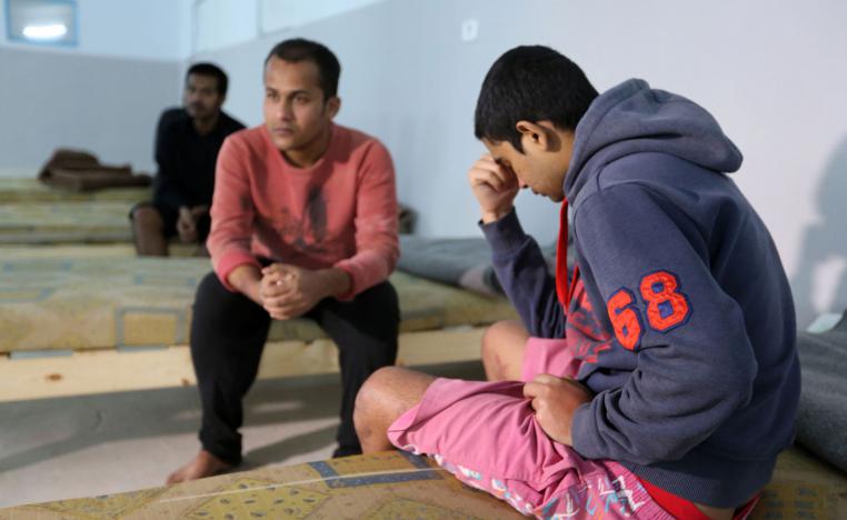 Survivors of the shipwreck at a shelter in the Tunisian coastal city of Zarzis 