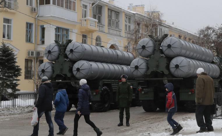 People walk past Russian S-400 missile air defence systems in city of Volgograd, Russia