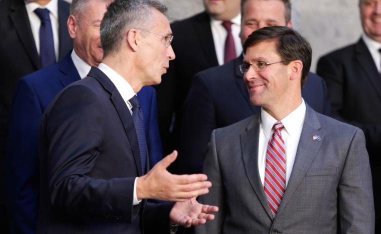 NATO Secretary General Jens Stoltenberg (L) speaks with acting US Secretary for Defense Mark Esper