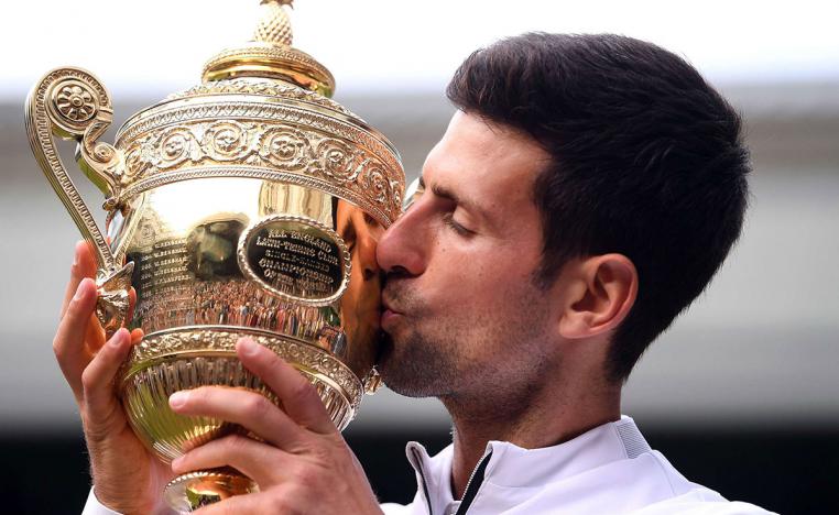 ديوكوفيتش ينقذ نقطتين، ويعانق اللقب التاريخي