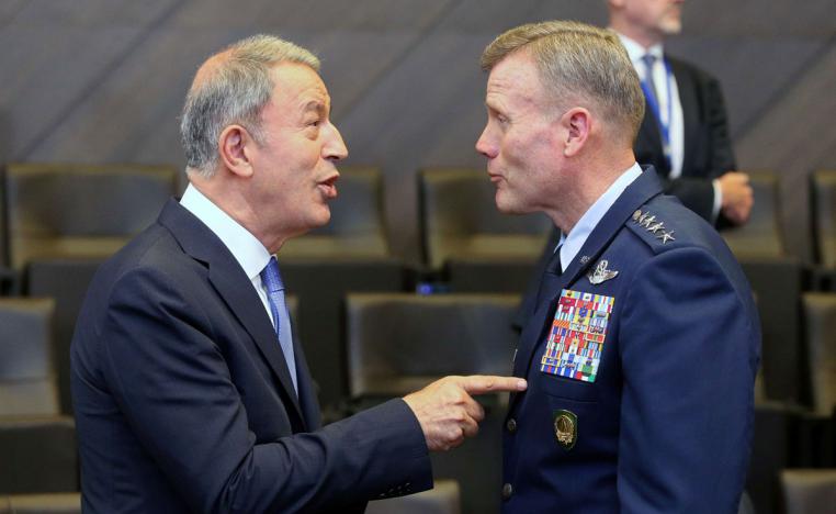 Turkish Defence Minister Hulusi Akar (L) and Supreme Allied Commander Europe US Air Force General Tod Wolters