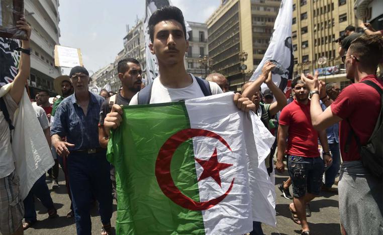 Around a dozen protesters were arrested and placed in police vans