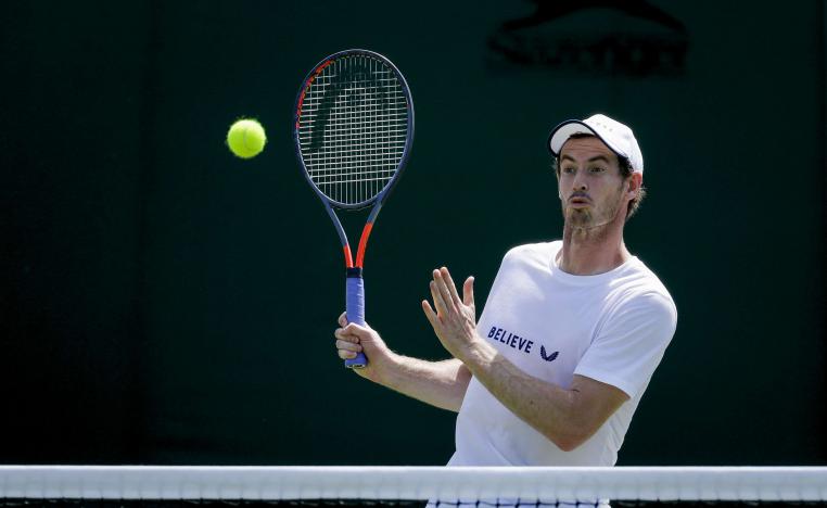 بطل ويمبلدون مرتين في الفردي يشارك إلى جوار أوغ إيربير