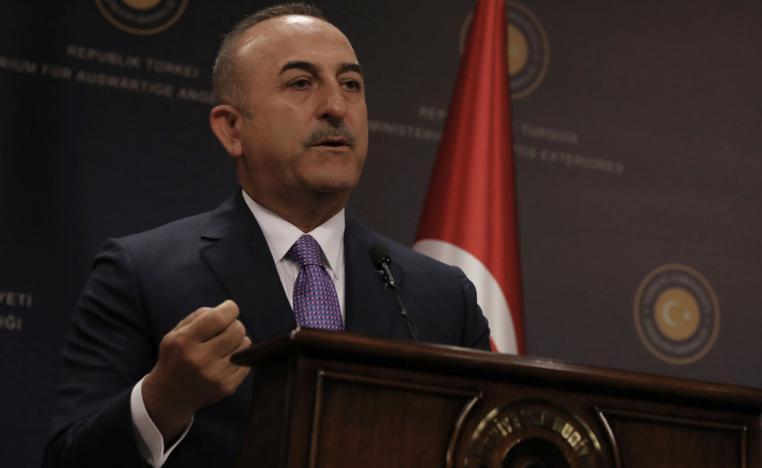 Turkey's Foreign Minister Mevlut Cavugoglu speaks during a news conference in Ankara