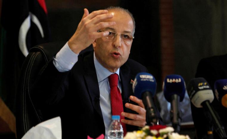 Central Bank of Libya director, Sadiq al-Kabir, gestures during a news conference in Tripoli