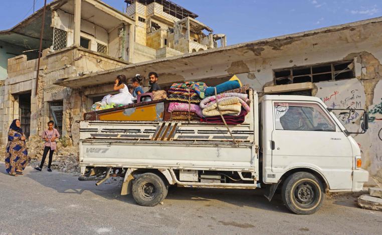 A Syrian displaced family, who fled their hometown of Khan Sheikhun