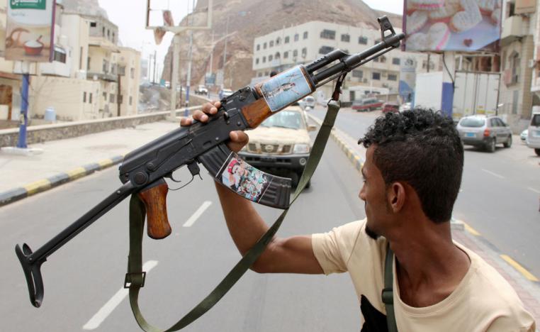 A member of Yemen's southern separatist holds his weapon