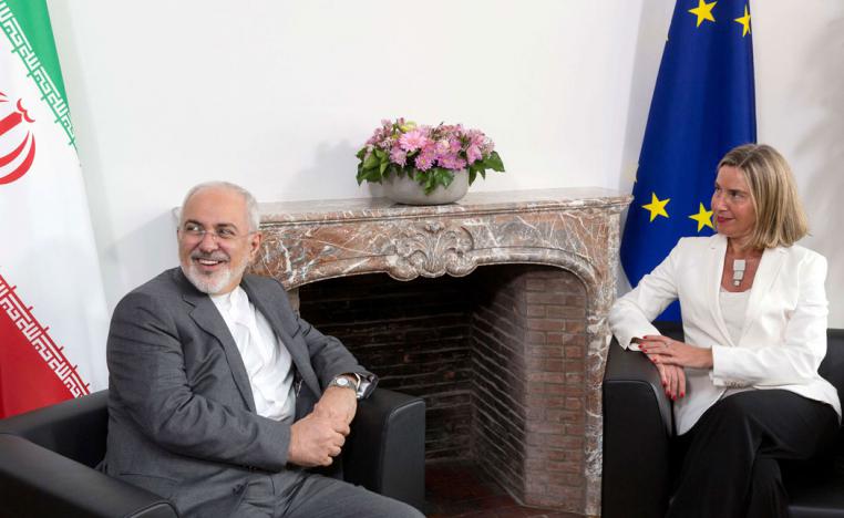 Iran's Foreign Minister Mohammad Javad Zarif attends a meeting with European Union foreign policy chief Federica Mogherini