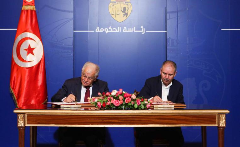 رئيس الحكومة المفوض (يسار) والأمين العام لاتحاد الشغل