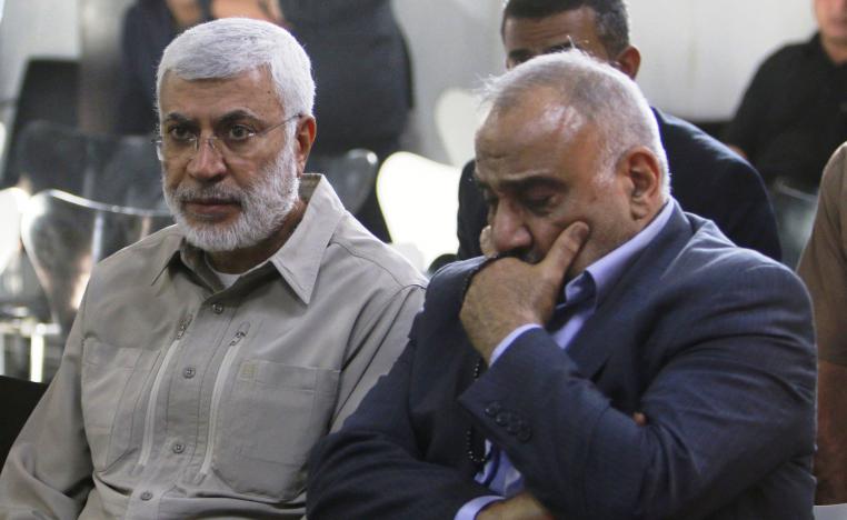 رئيس الوزراء العراقي عادل عبدالمهدي والقيادي في الحشج الشعبي أبومهدي المهندس