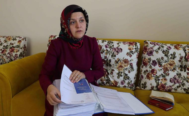 His wife, Sumeyye Yilmaz, says CCTV footage shows him being confronted outside their home after leaving for work