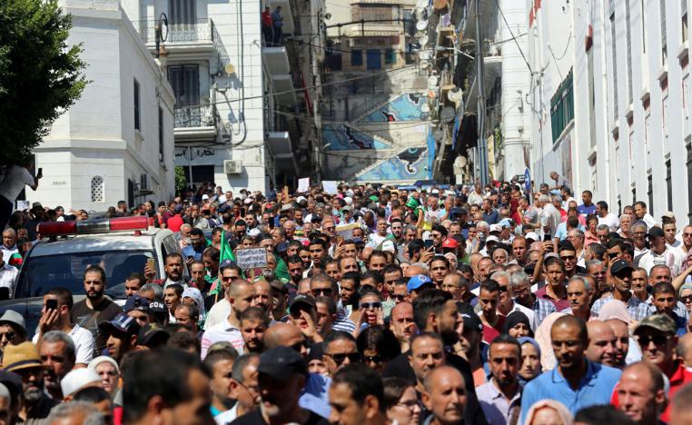 Demonstrators gather during a protest demanding social,  economic and political reforms in Algiers