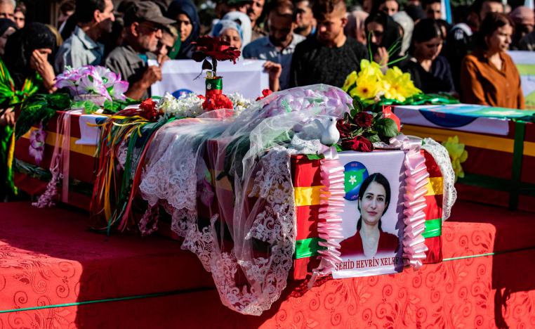 Mourners attend a funeral for Kurdish political leader Hevrin Khalaf and others including civilians and Kurdish fighters, in the northeastern town of al-Malikiyah/Derik