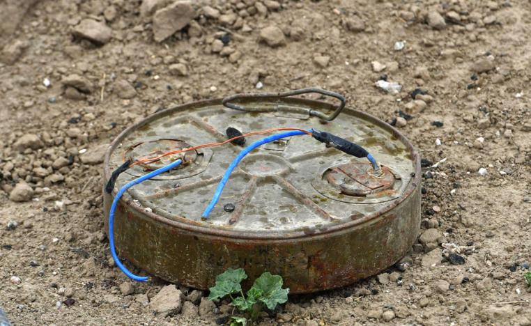 Discarded landmine lying on the ground in the village of Baghouz in Syria's eastern Deir Ezzor province