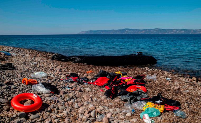 Life jackets used by refugees lie on a beach in Skala Sykamias on the island of Lesbos